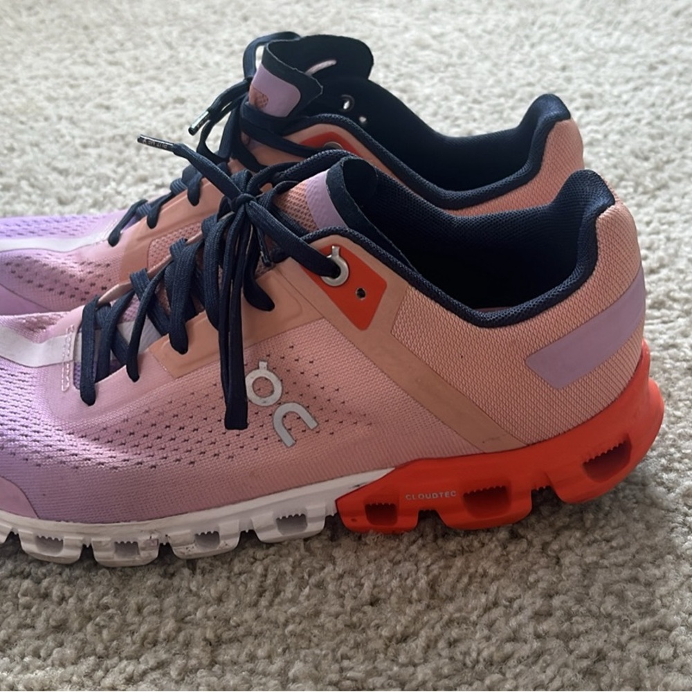 On Clouds Cloudtec. Light purple, light orange and white/black. Size 7.5.